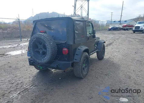 2002 Jeep Wrangler Sahara z USA, uszkodzony, nr VIN 1J4FA59S32P744124